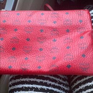 MCM Red Clutch with Textured Design